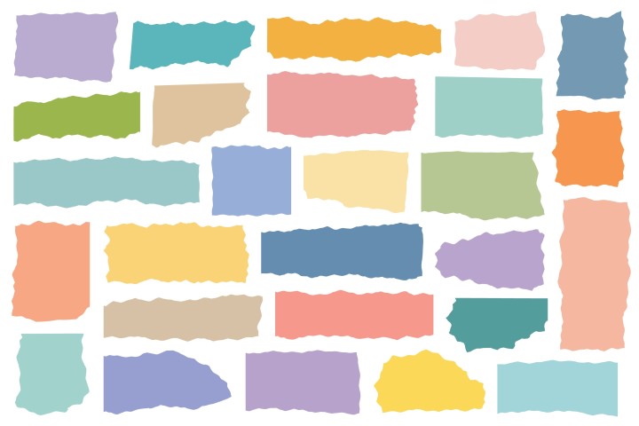 Collection of various colored ripped paper pieces on white background.