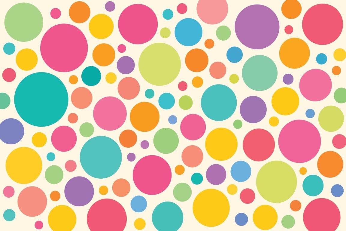 Colorful polka dot pattern on a soft background.