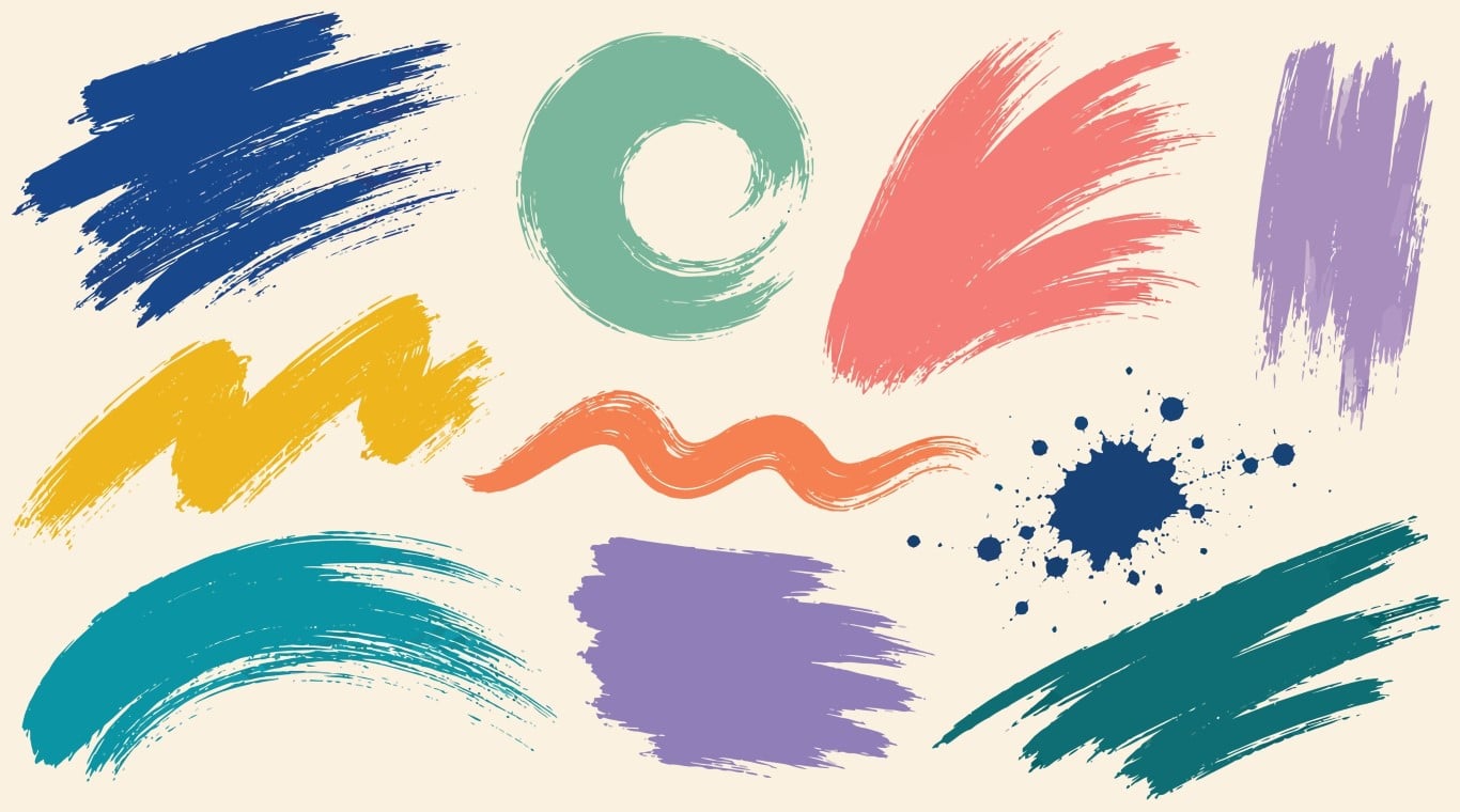 Set of colorful grunge brush strokes on a light background.