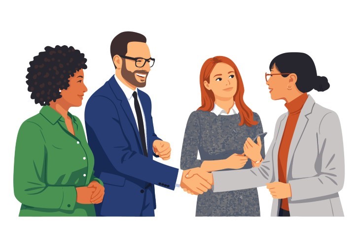 Diverse professionals shaking hands after a successful business agreement.