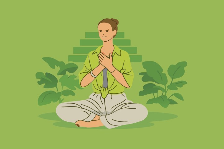 Woman practicing meditation and breathing exercises in a green nature environment.