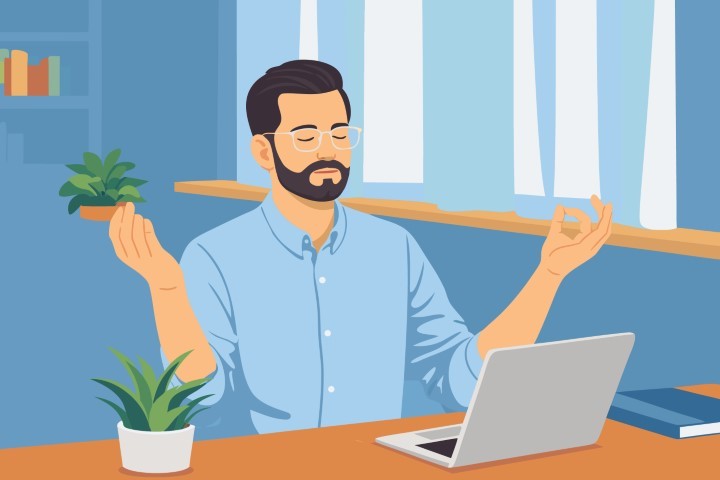 Man juggling a small plant and objects while working at a laptop in his office.