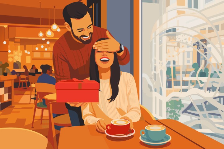Happy couple celebrating a special event with cake and gifts at home.