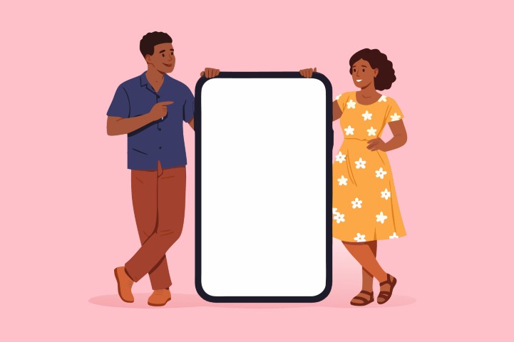 Young couple holding a large blank smartphone screen together for a romantic message.