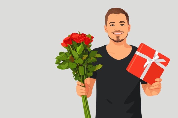 Cool man holding a bouquet of red roses and a gift box for a date.