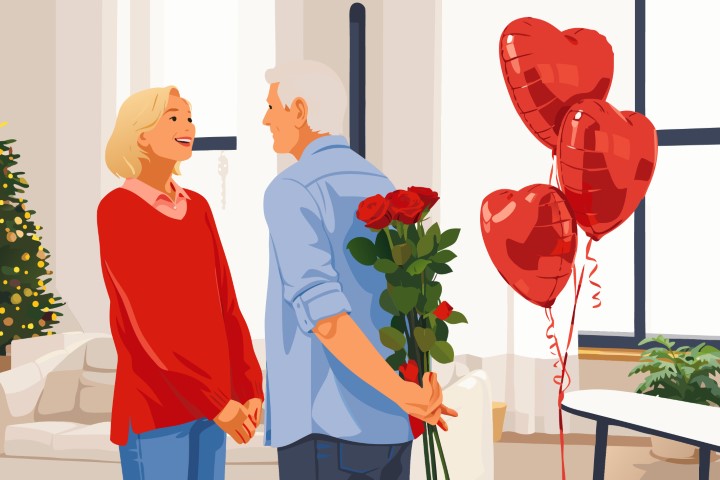 Man surprised by a woman with a bunch of heart balloons in a living room.