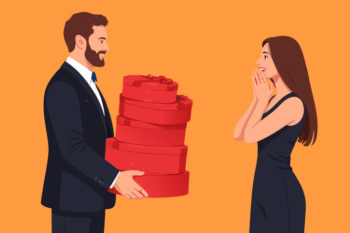 Professional couple in formal attire standing and holding many gifts.