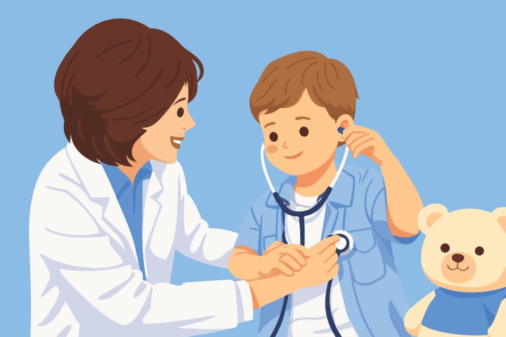 Professional doctor using a stethoscope to examine a young boy in a medical clinic.