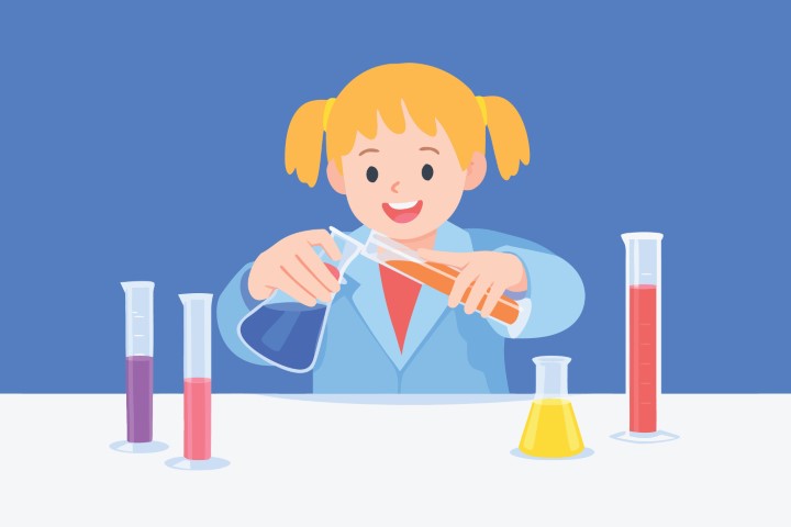 Young girl performing a chemistry experiment with colorful liquids in a lab.