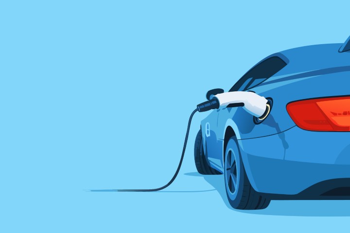 Electric car being charged at a modern charging station outdoors.