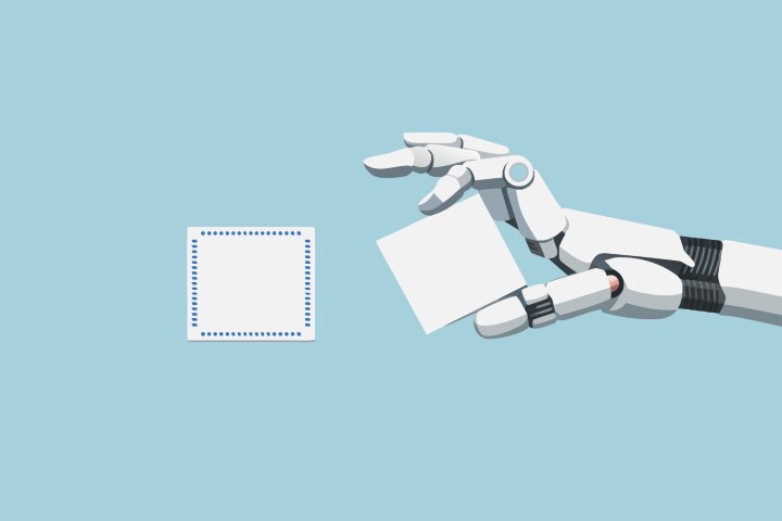 Robotic hand holding a white blank paper against a blue background.